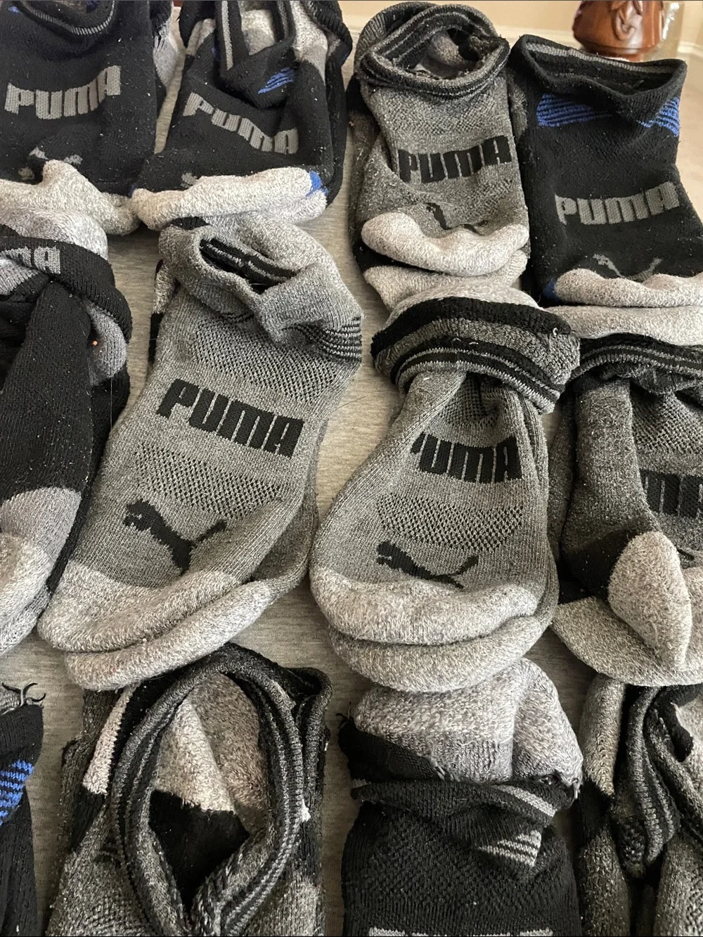 17 pairs of Puma Men's No-Show Athletic Socks in Black and Gray with Blue Accent